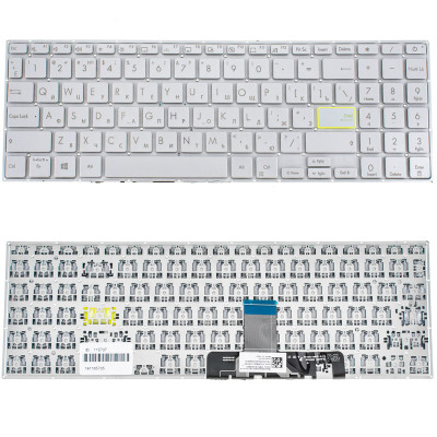Ноутбук ASUS X521: стильная серебристая клавиатура без фрейма.